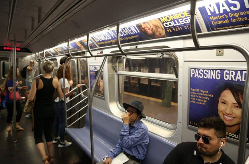 Monroe College Subway Signage